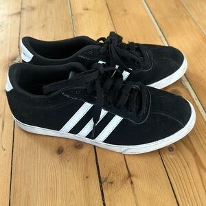 Black adidas court shoes